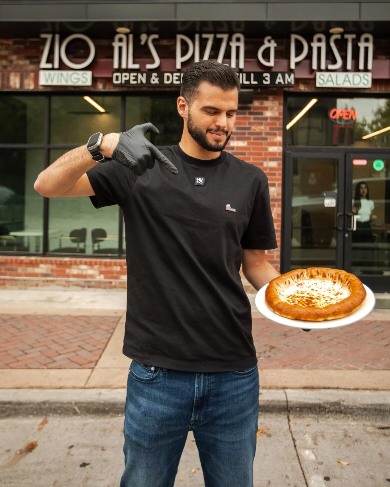 Freshly baked cheese pizza at Zio Al's Pizza & Pasta