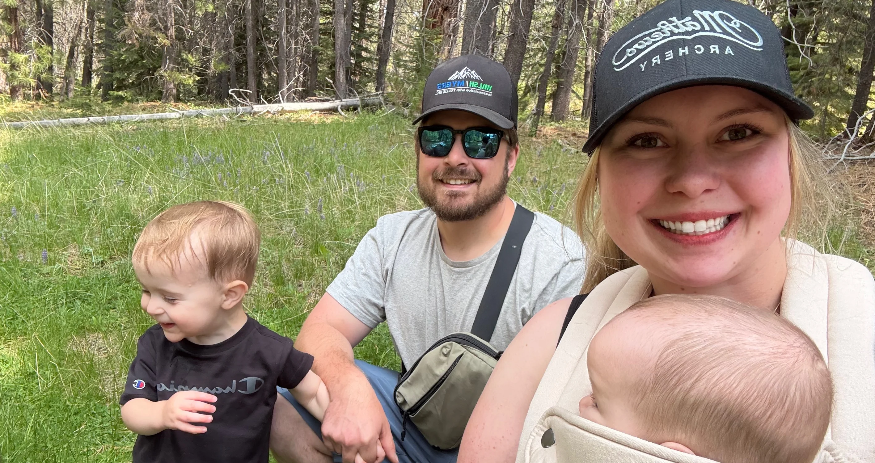 Family enjoying a day outdoors in a forest setting