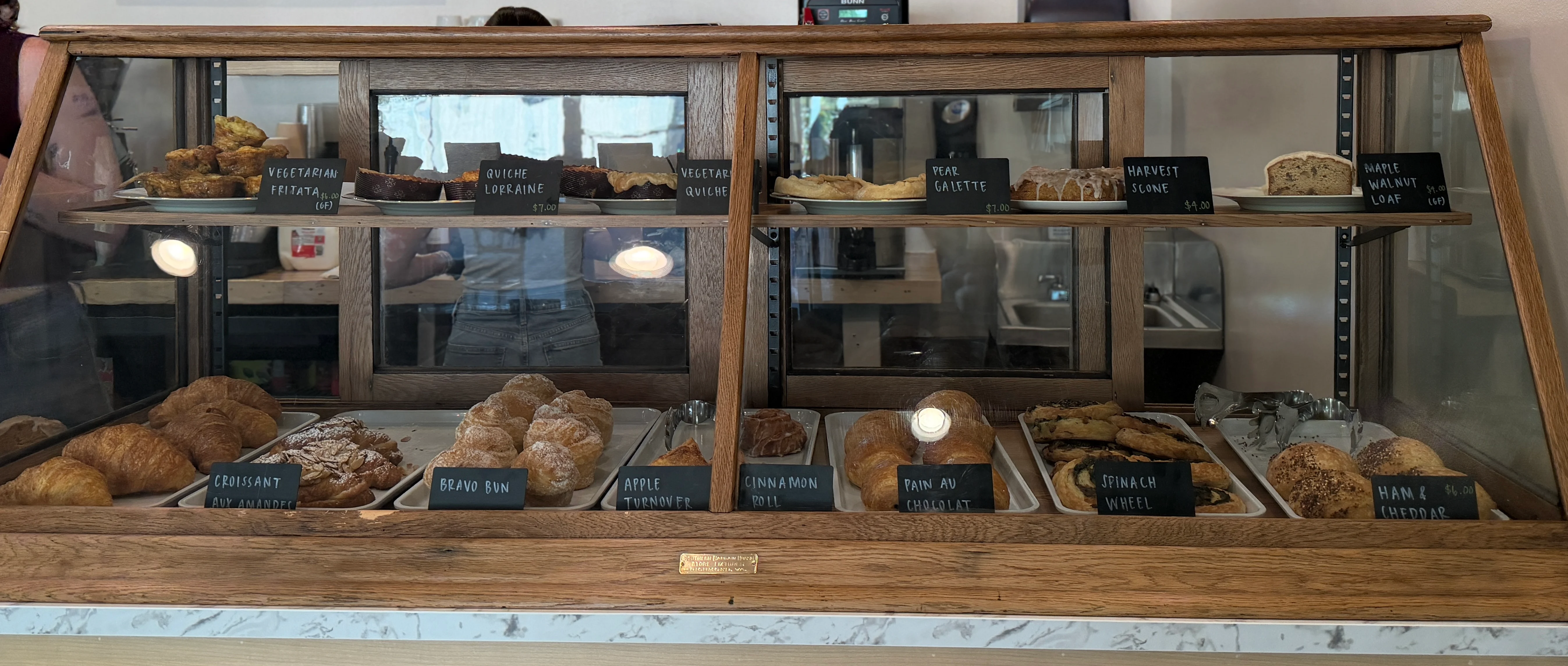 Cozy café display with pastries and coffee menu