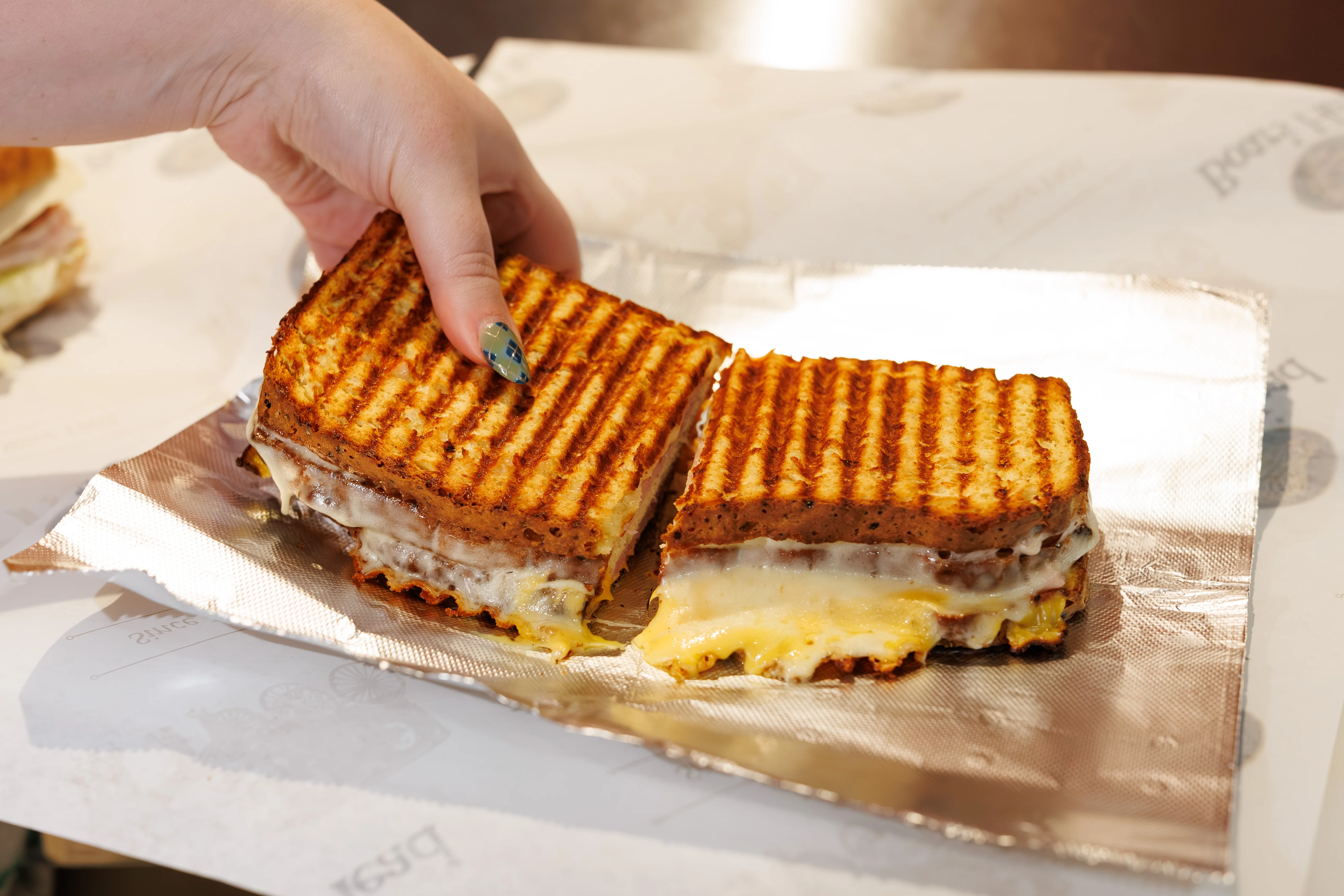 Grilled Cuban sandwich with melted cheese