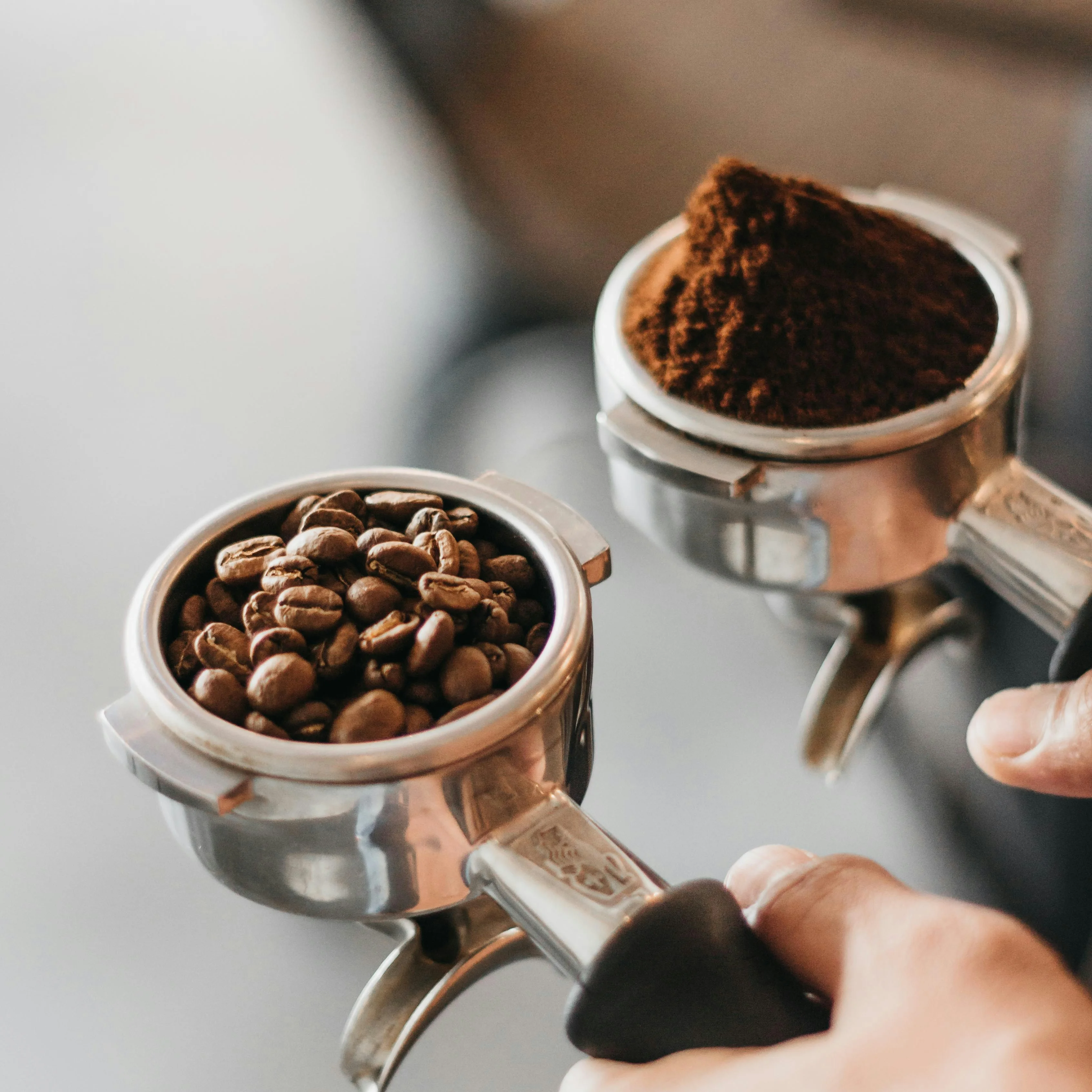 Coffee beans and ground coffee in a portafilter