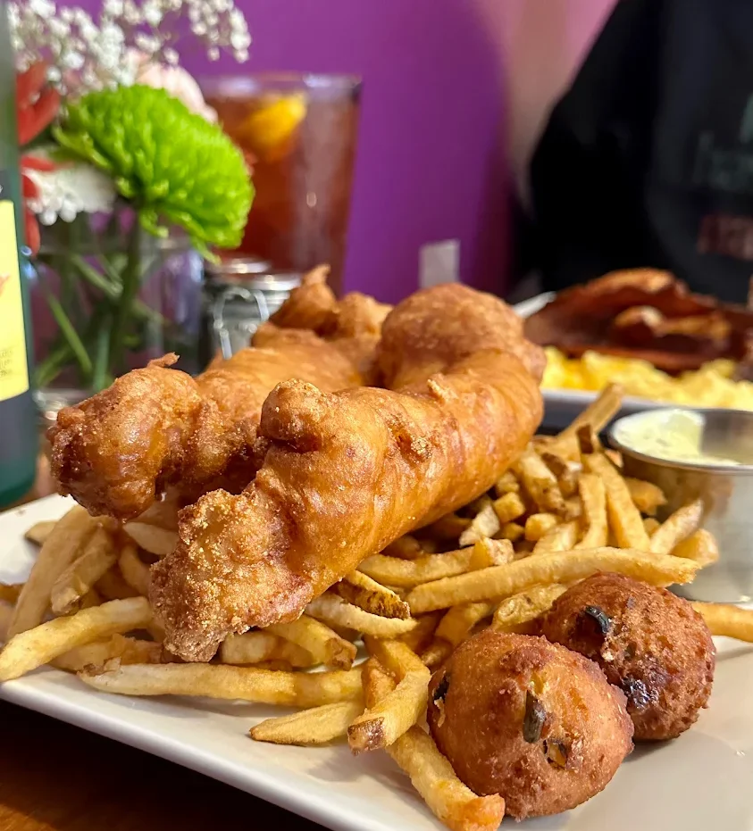 Southern-style fish and chips with fries and hushpuppies