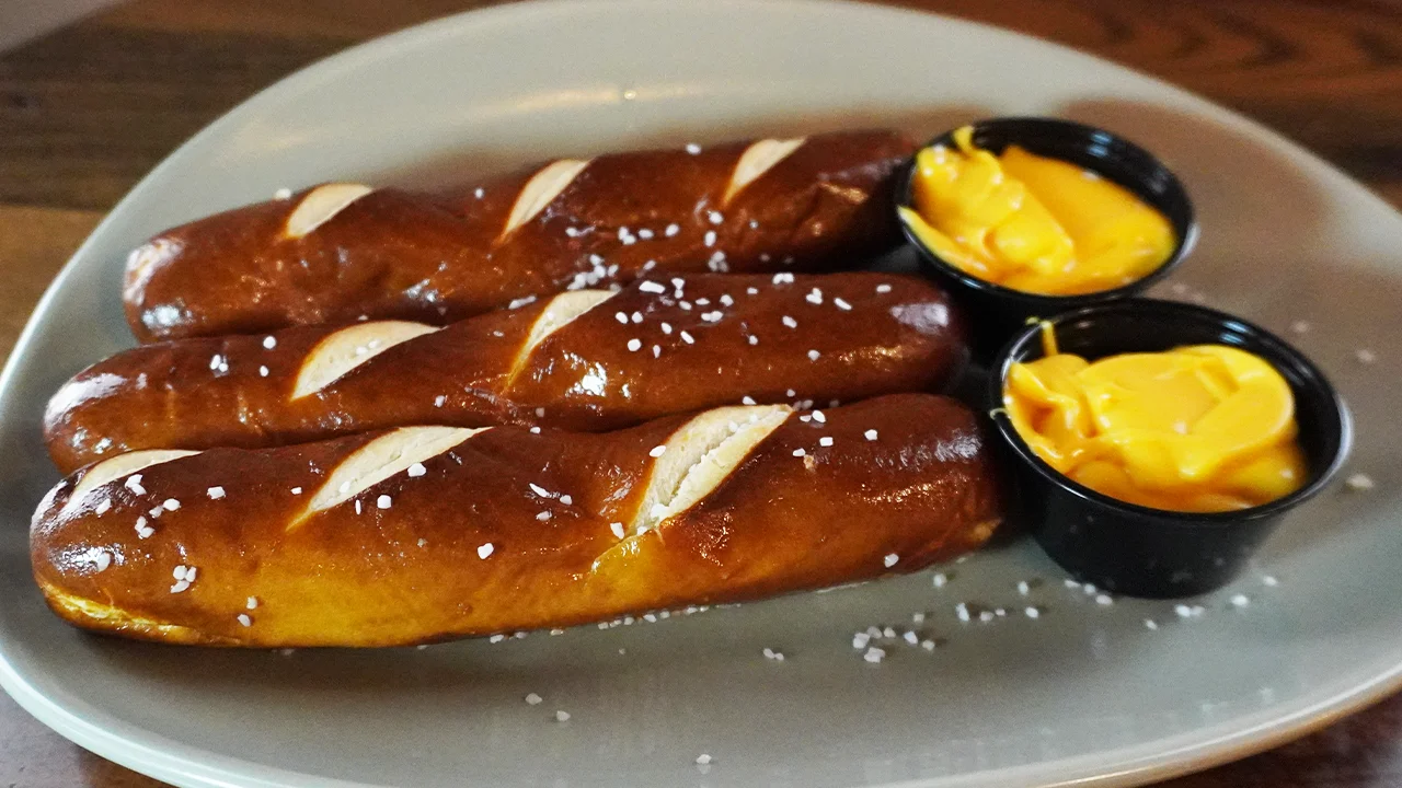 Soft pretzels served with cheese dip