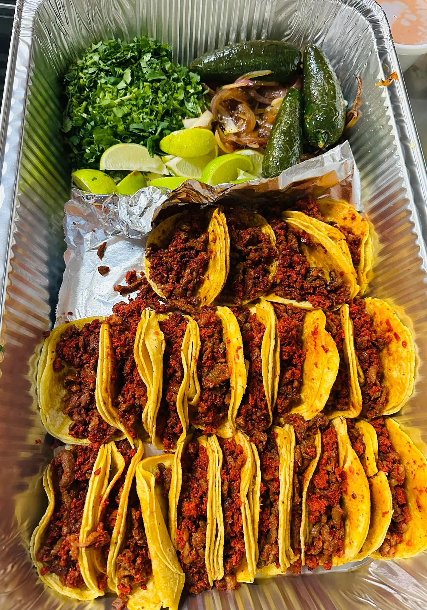 Delicious Mexican street tacos with chorizo and fresh toppings