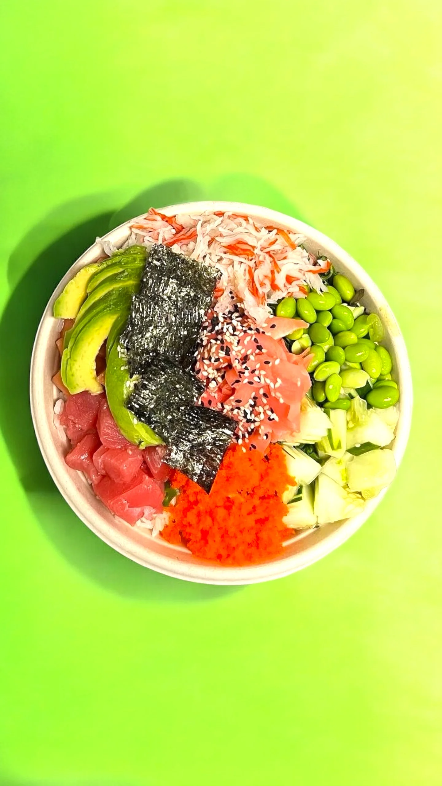 Colorful Japanese chirashi bowl with fresh seafood and vegetables
