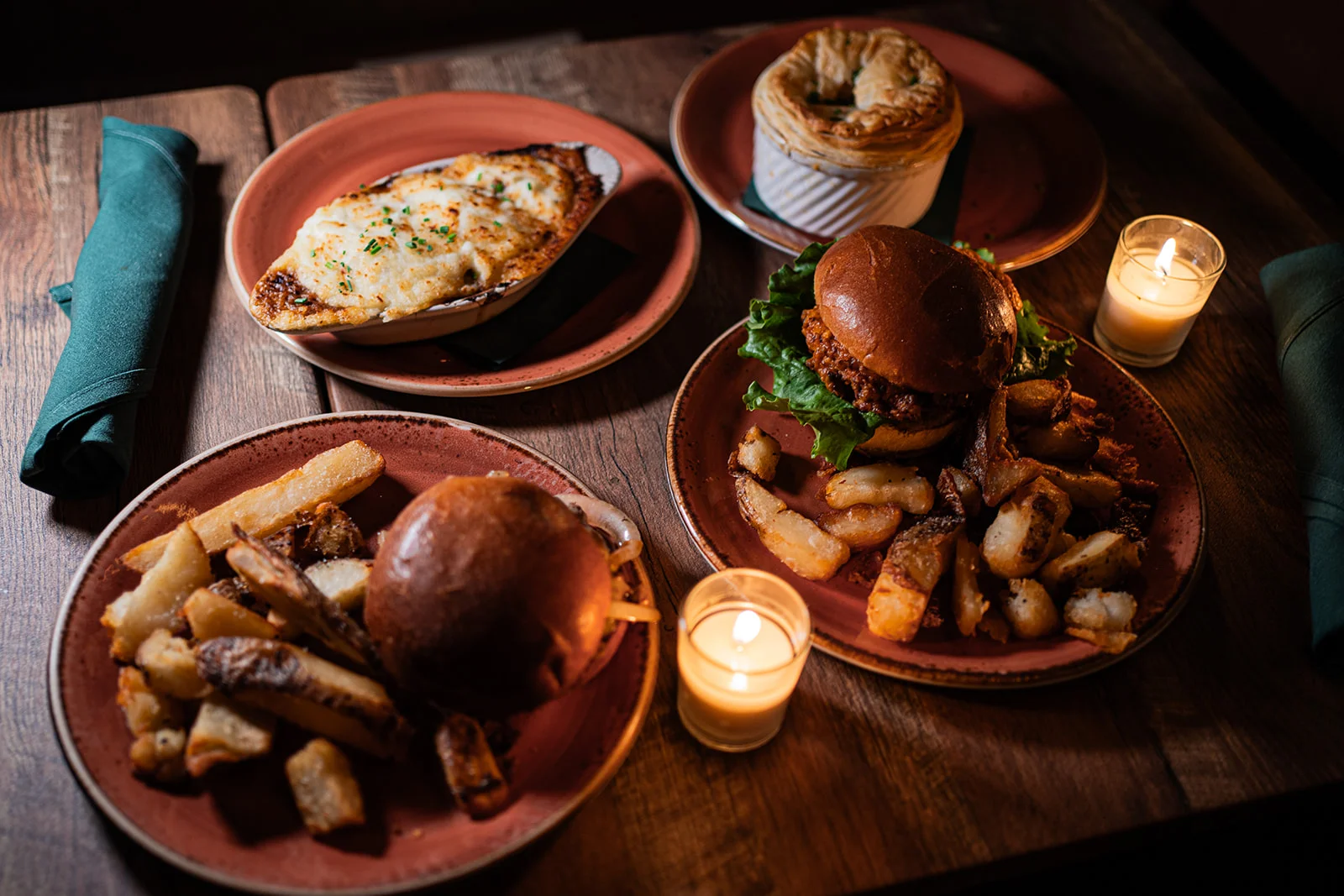 Hearty British pub meal with burger and shepherd's pie