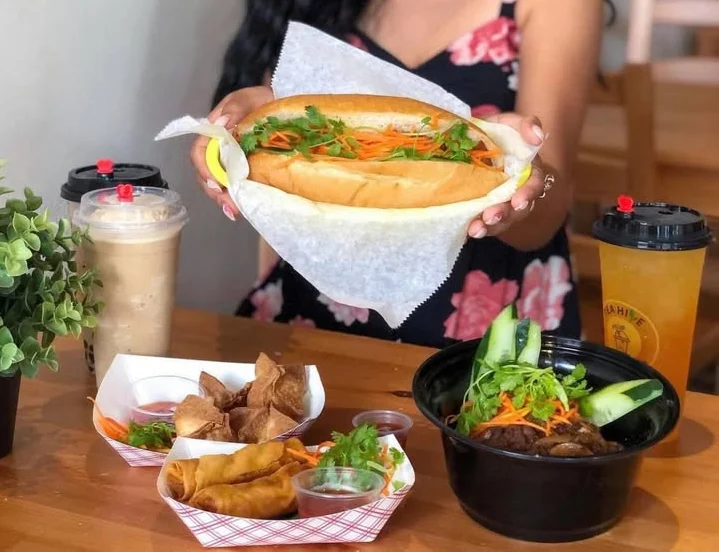 Vietnamese banh mi sandwich with fresh herbs and vegetables