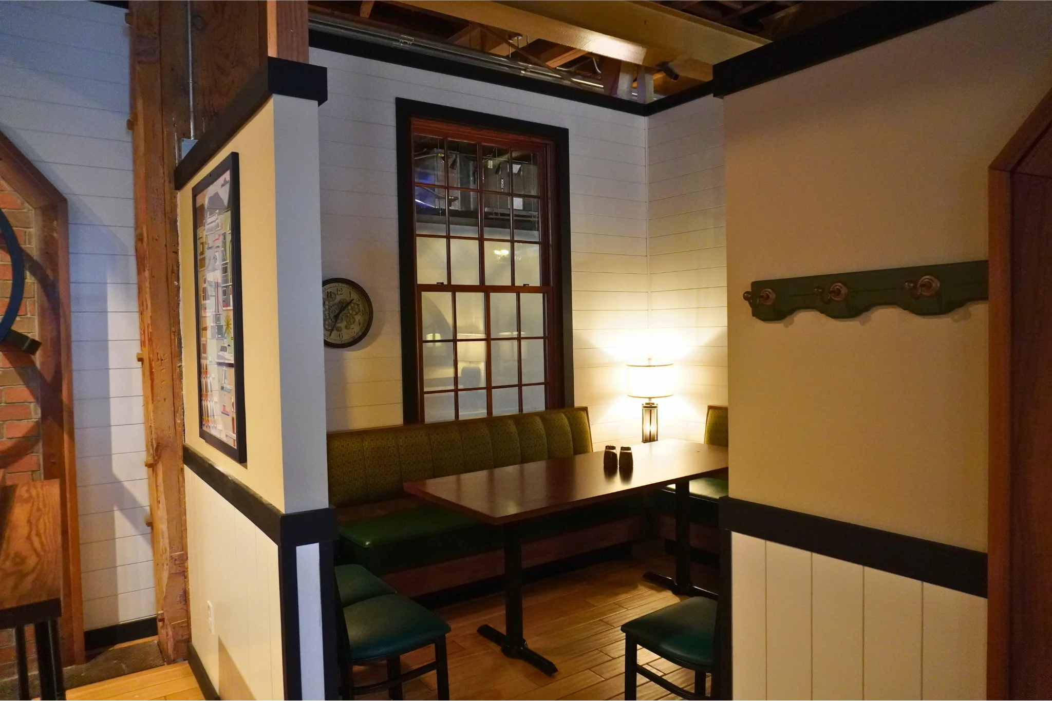 Cozy restaurant interior with warm lighting and wooden accents