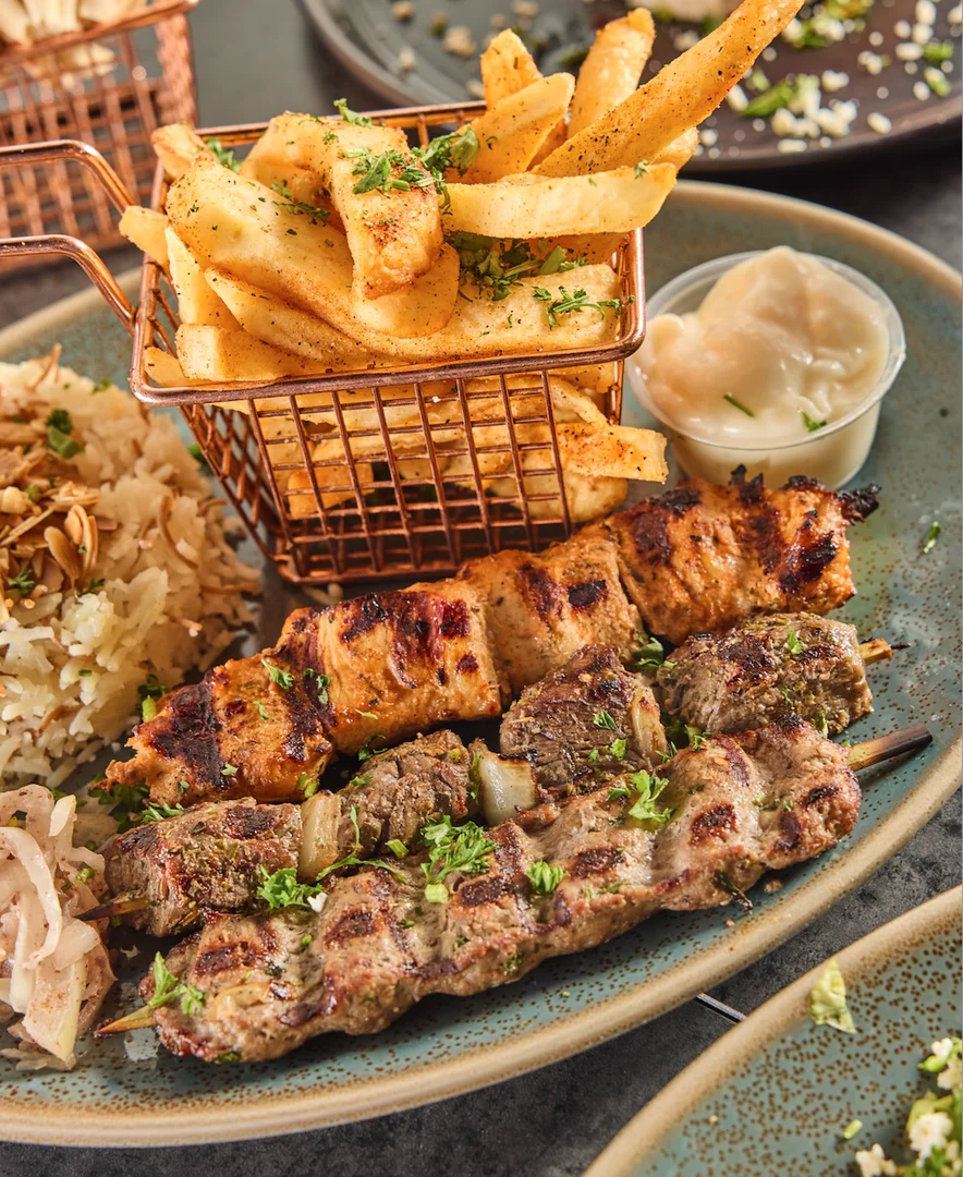 Sufrat Mix Grill Platter- A combination of grilled meats and Mediterranean favorites.
