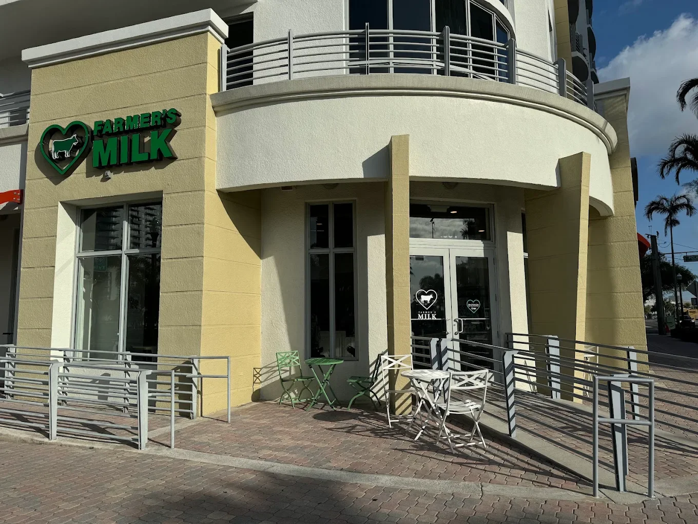 Exterior view of Farmer's Milk café with outdoor seating