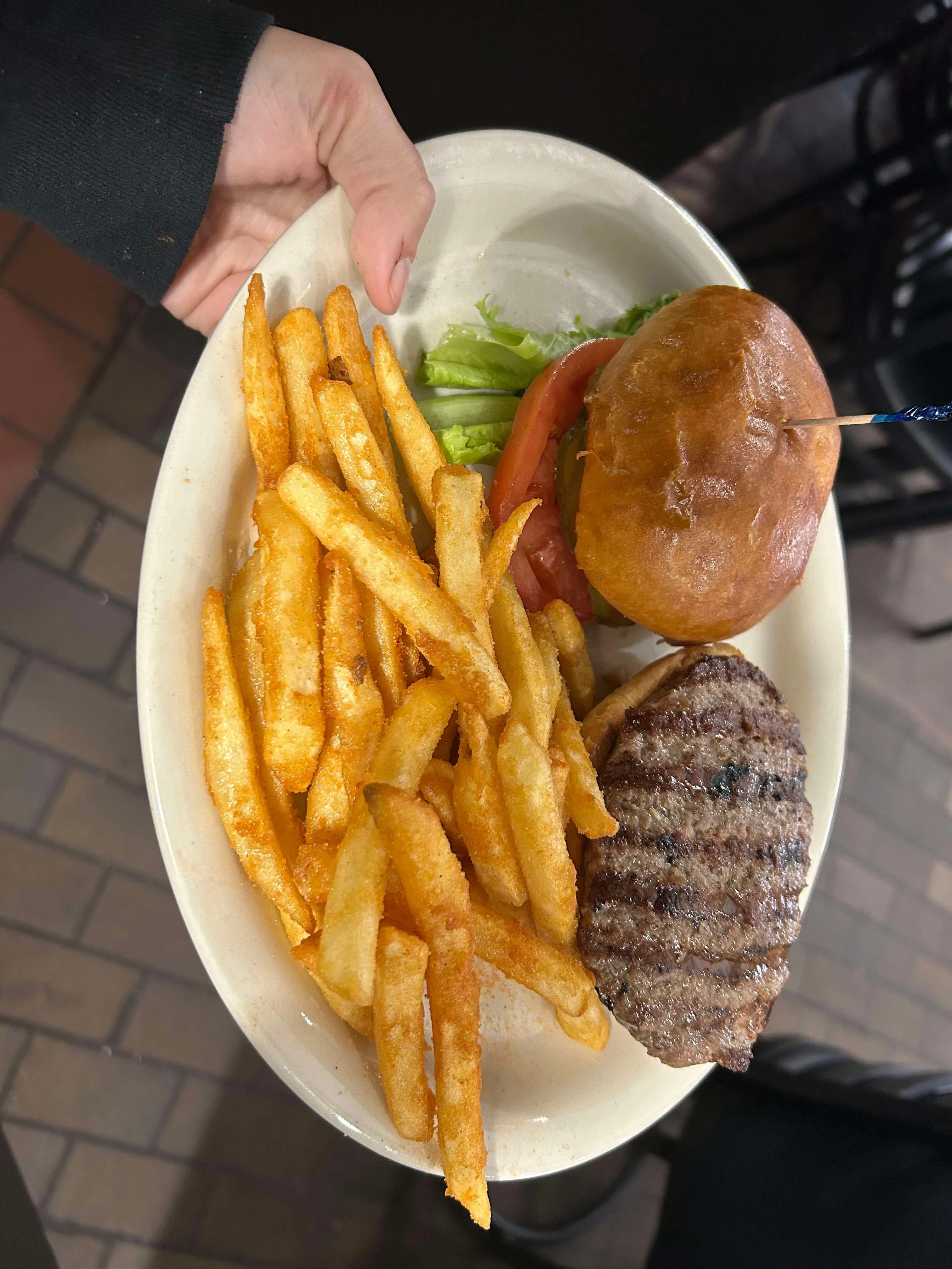 Classic American cheeseburger with fries