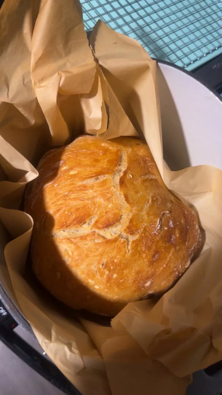 Freshly baked artisan bread in parchment