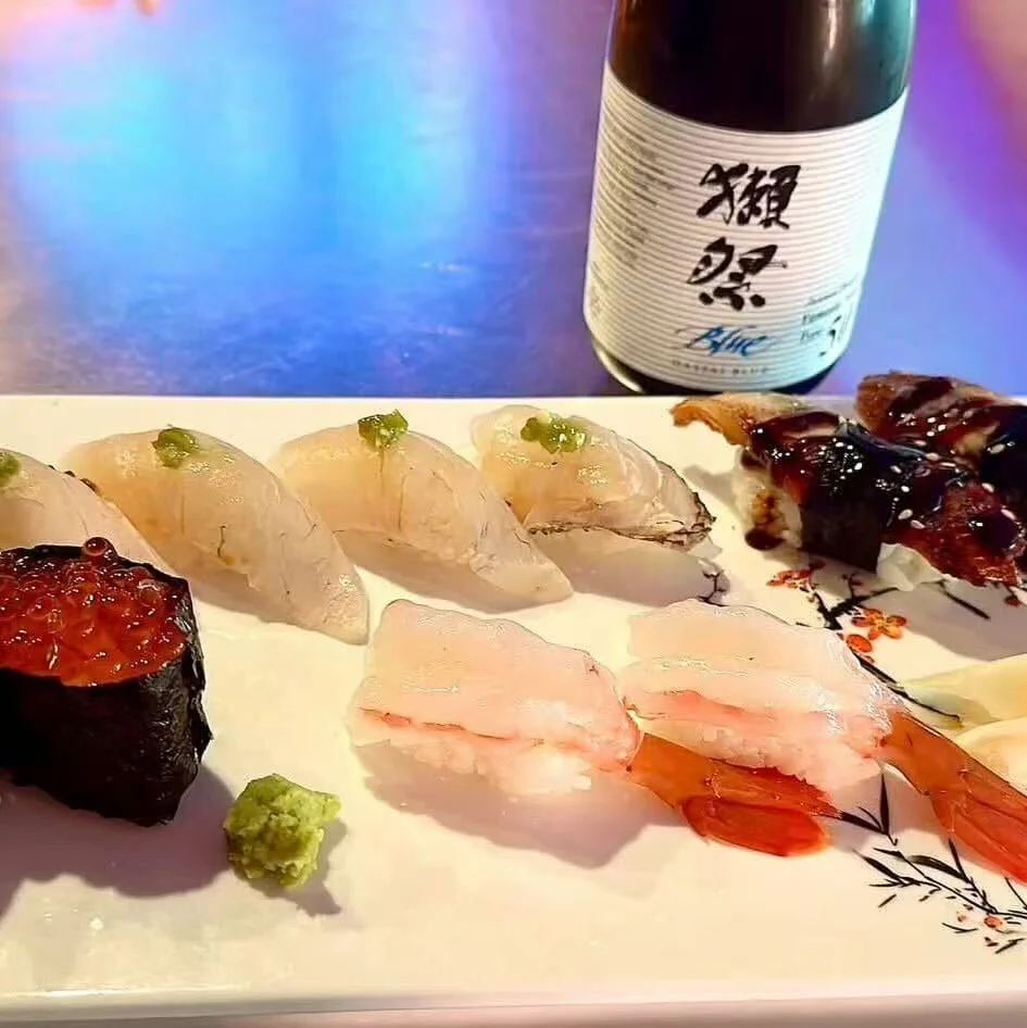 Assorted sushi platter with sake in a Japanese restaurant