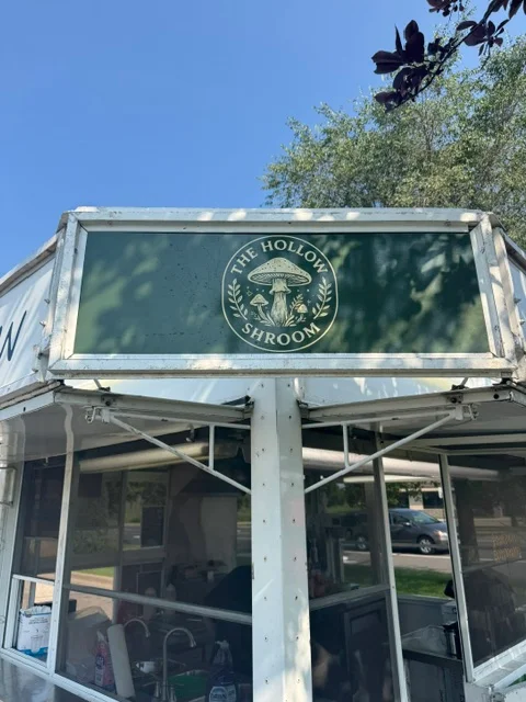 Food truck sign for The Hollow Shroom, specializing in mushroom dishes