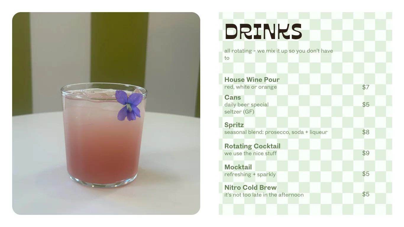 Colorful cocktail garnished with a flower in a modern glass