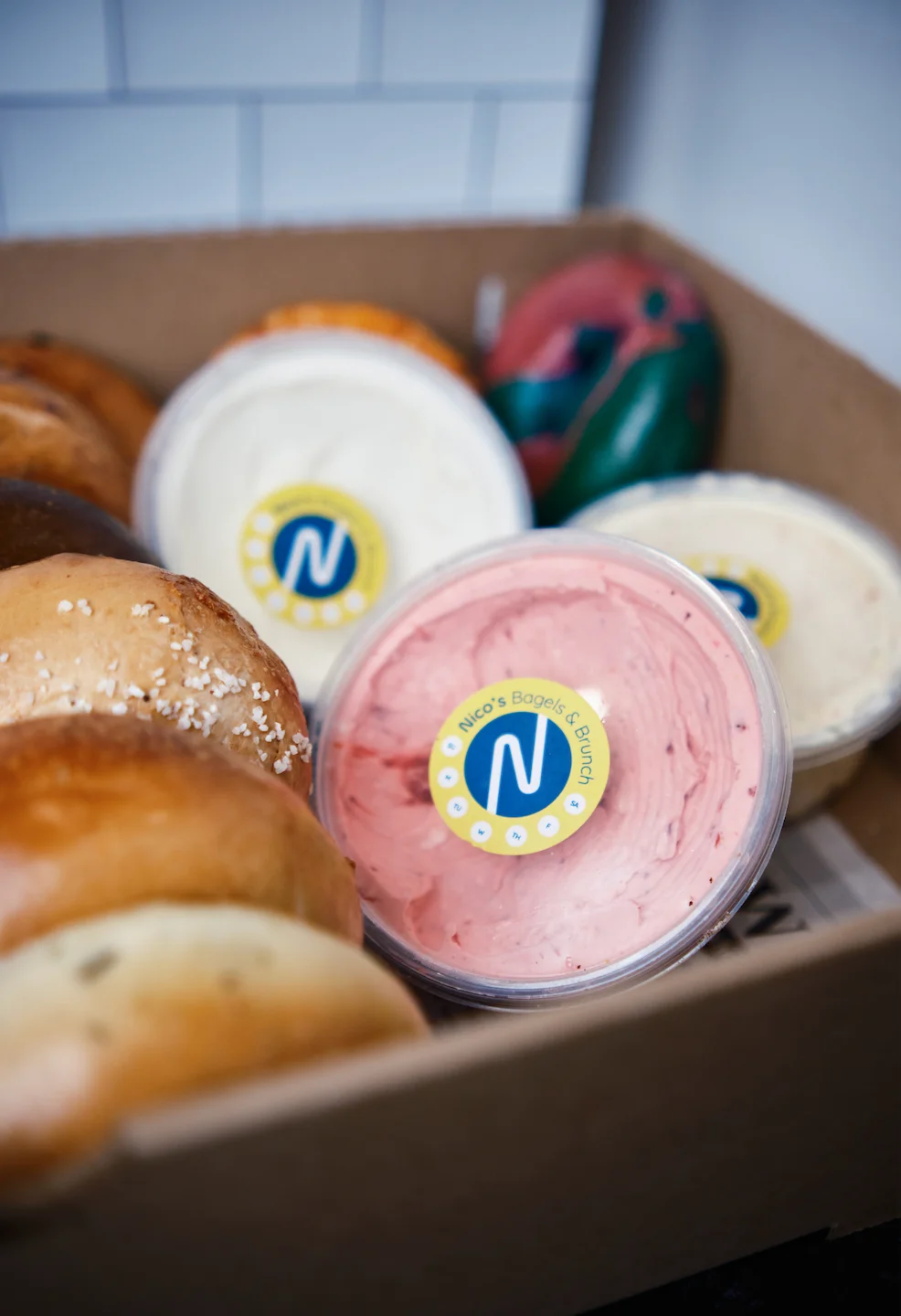 Assorted bagels with flavored cream cheeses