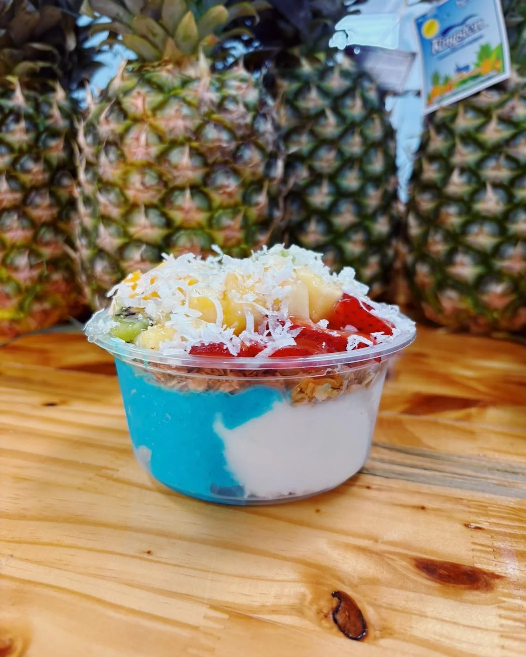 Colorful tropical fruit parfait with coconut