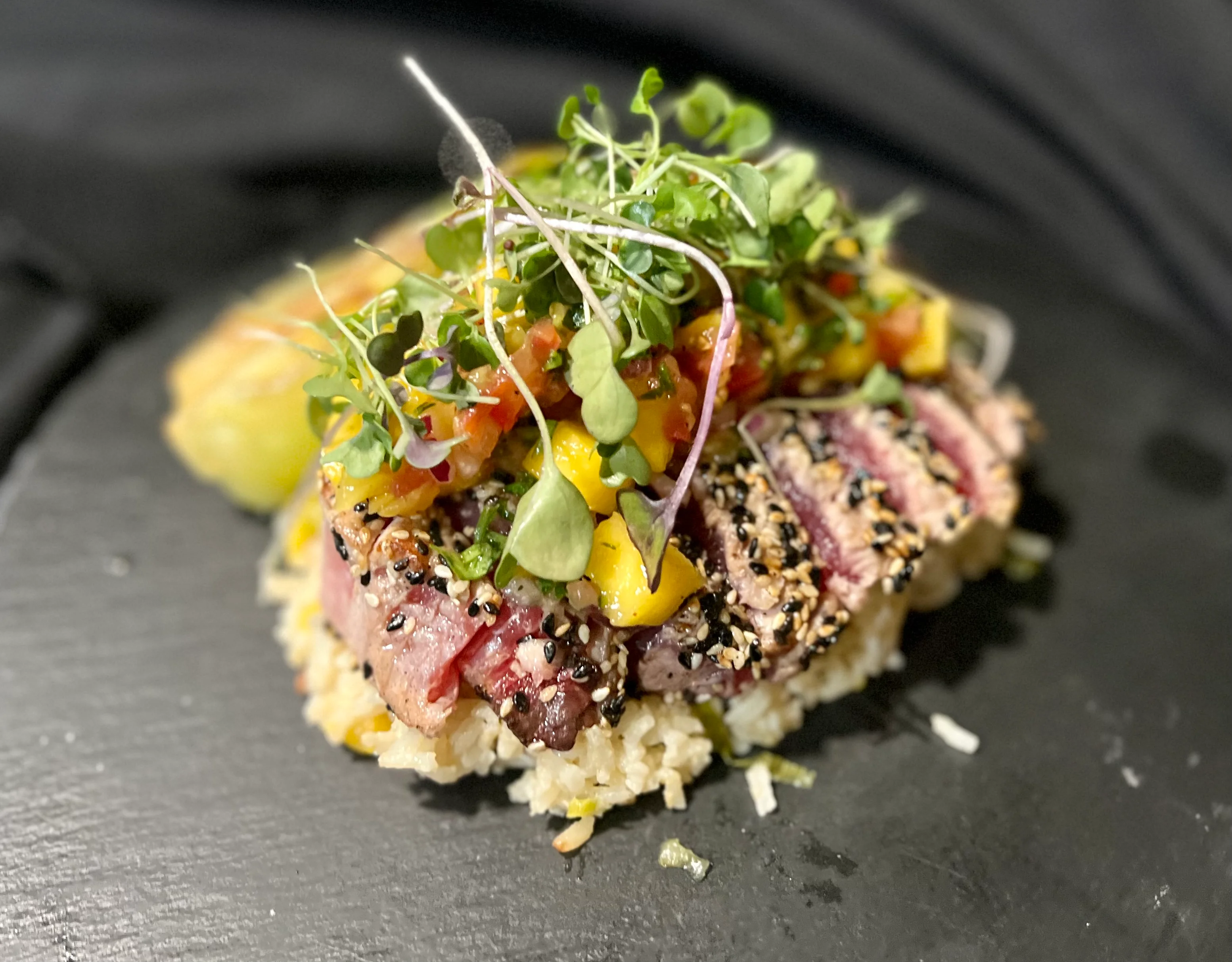 Seared tuna tataki with mango salsa on rice