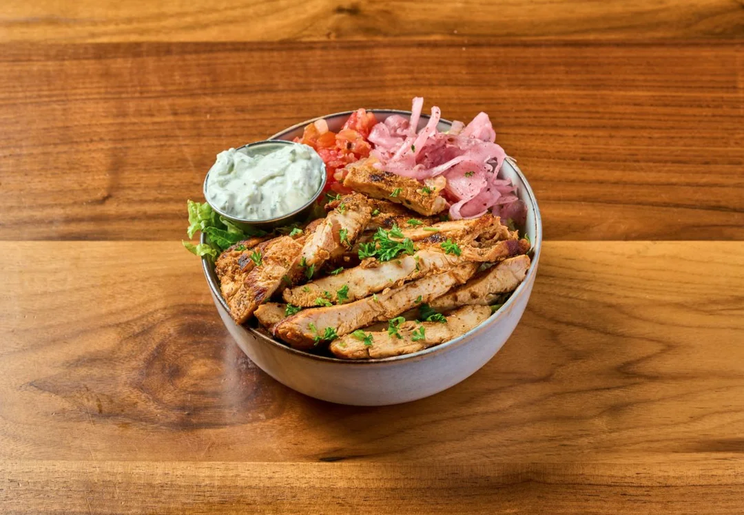 Gyro Chicken Bowl- Grilled chicken breast slices with lettuce, chopped tomatoes and onions.