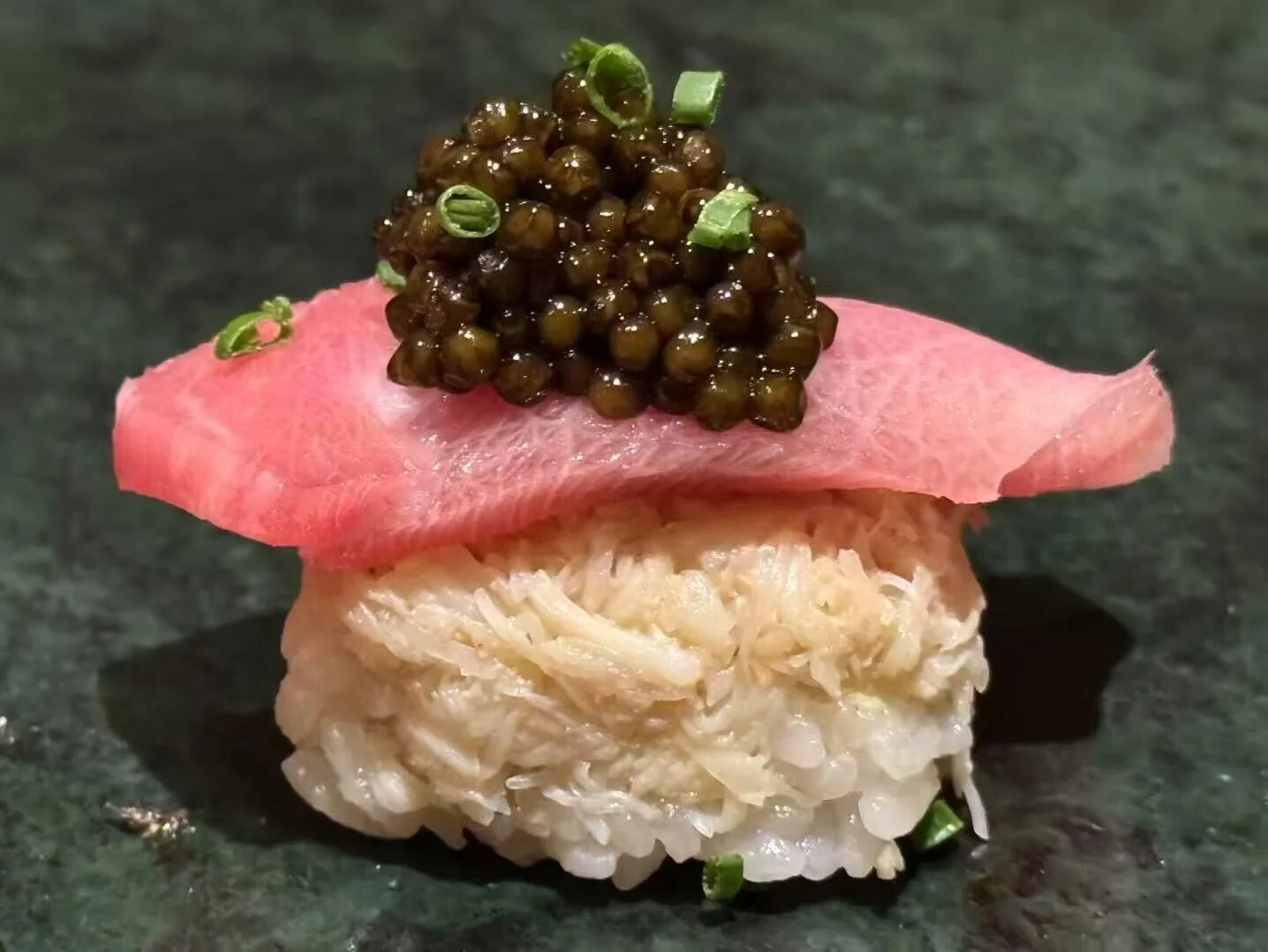 Japanese sushi with toro and caviar topping