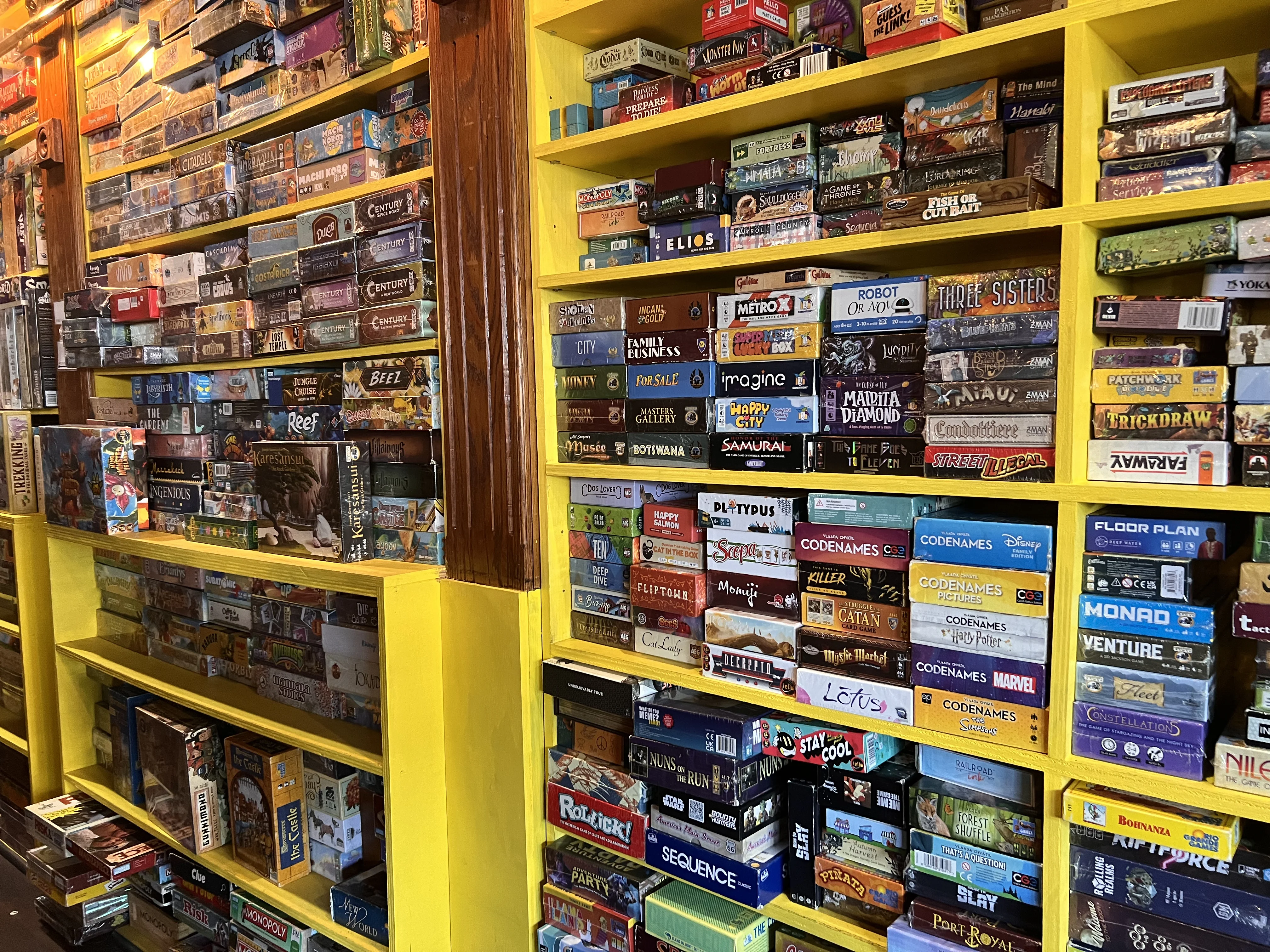 Picture of a few shelves of the game library