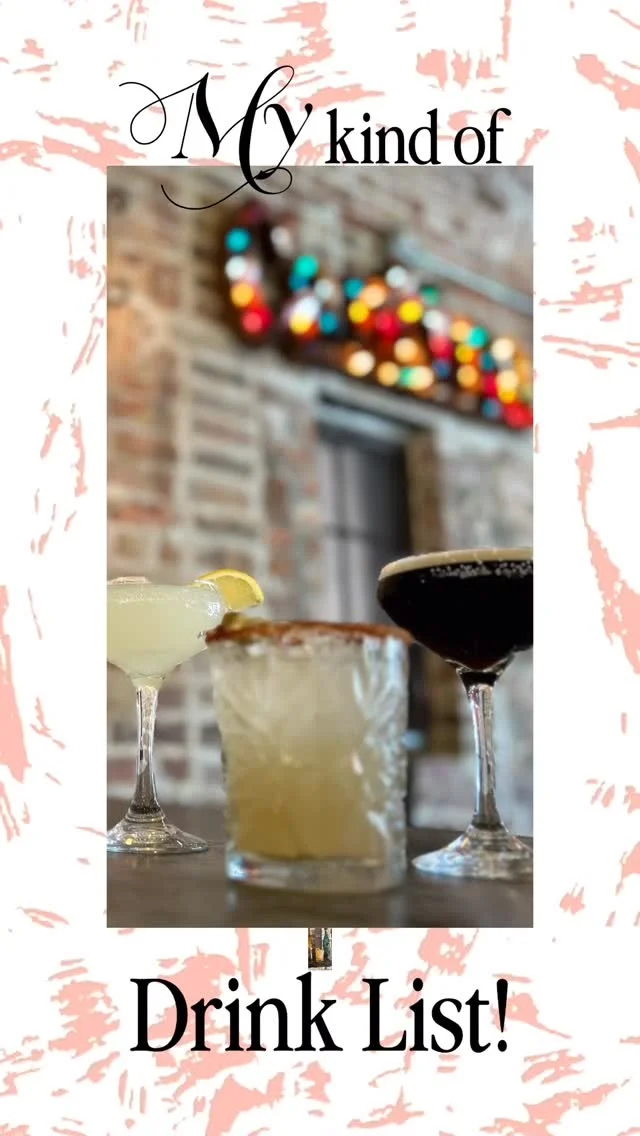 Colorful cocktails on a bar counter with a rustic backdrop