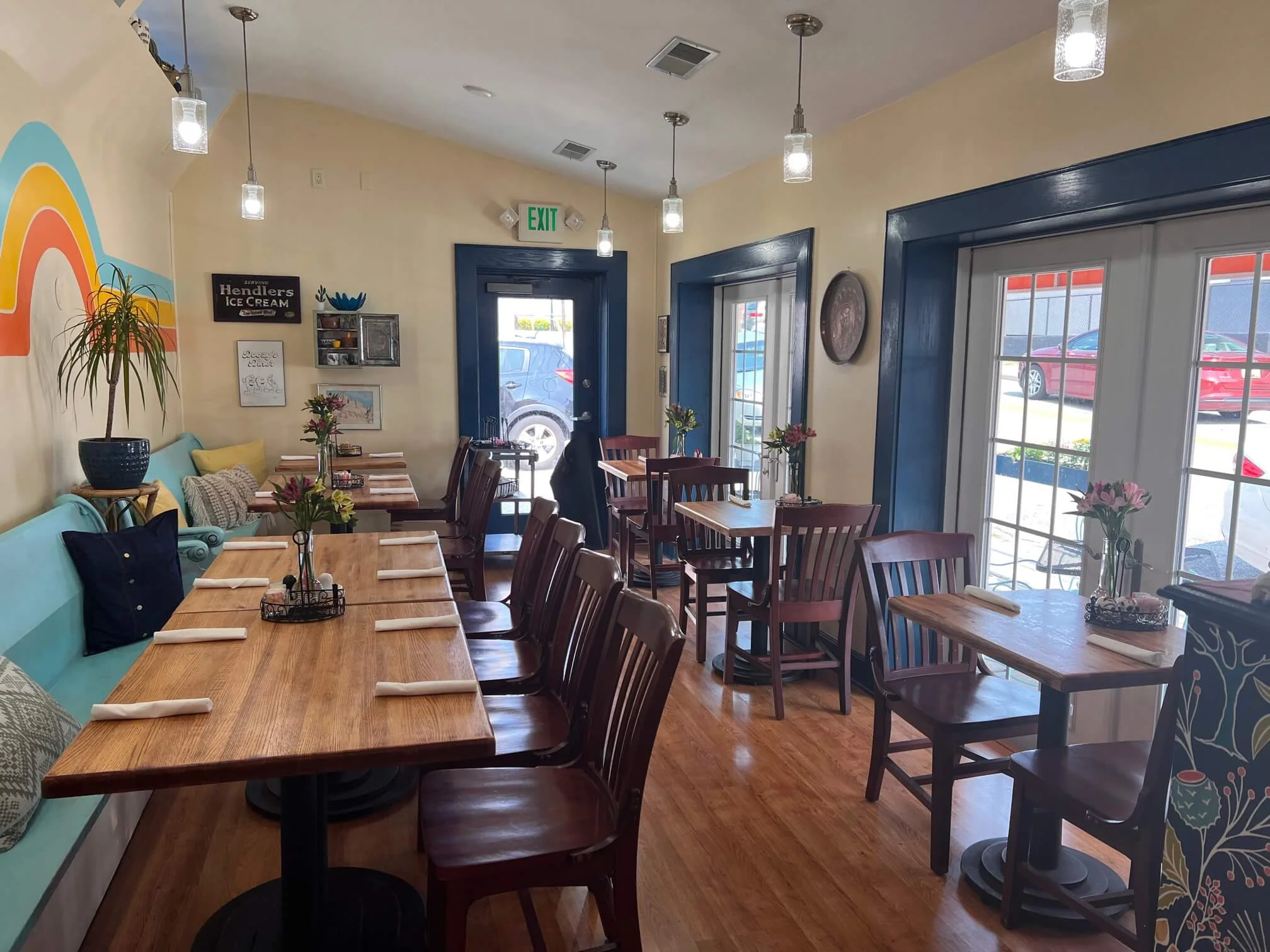 Cozy restaurant interior with wooden tables and colorful decor