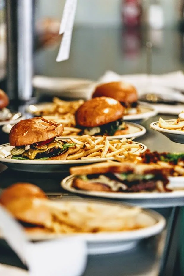 Juicy American cheeseburgers with crispy fries