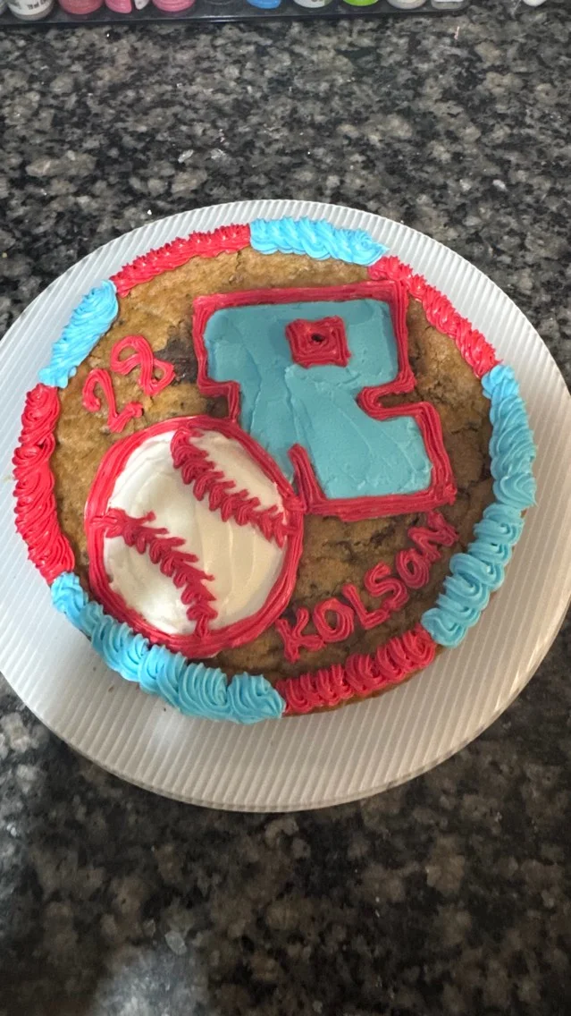 Decorative baseball-themed cookie cake for a celebration