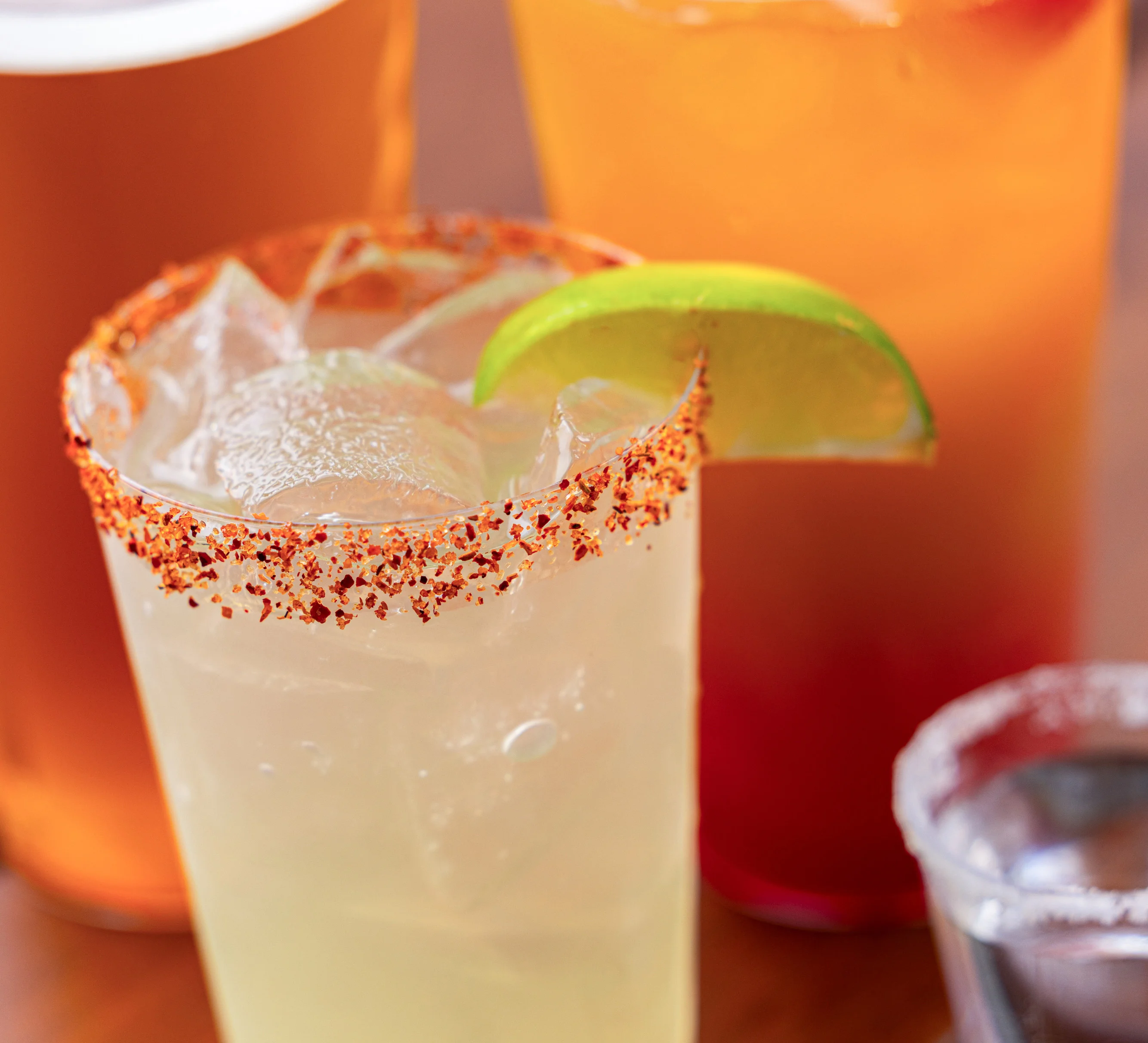 Daves margarita on tap garnished with a lime