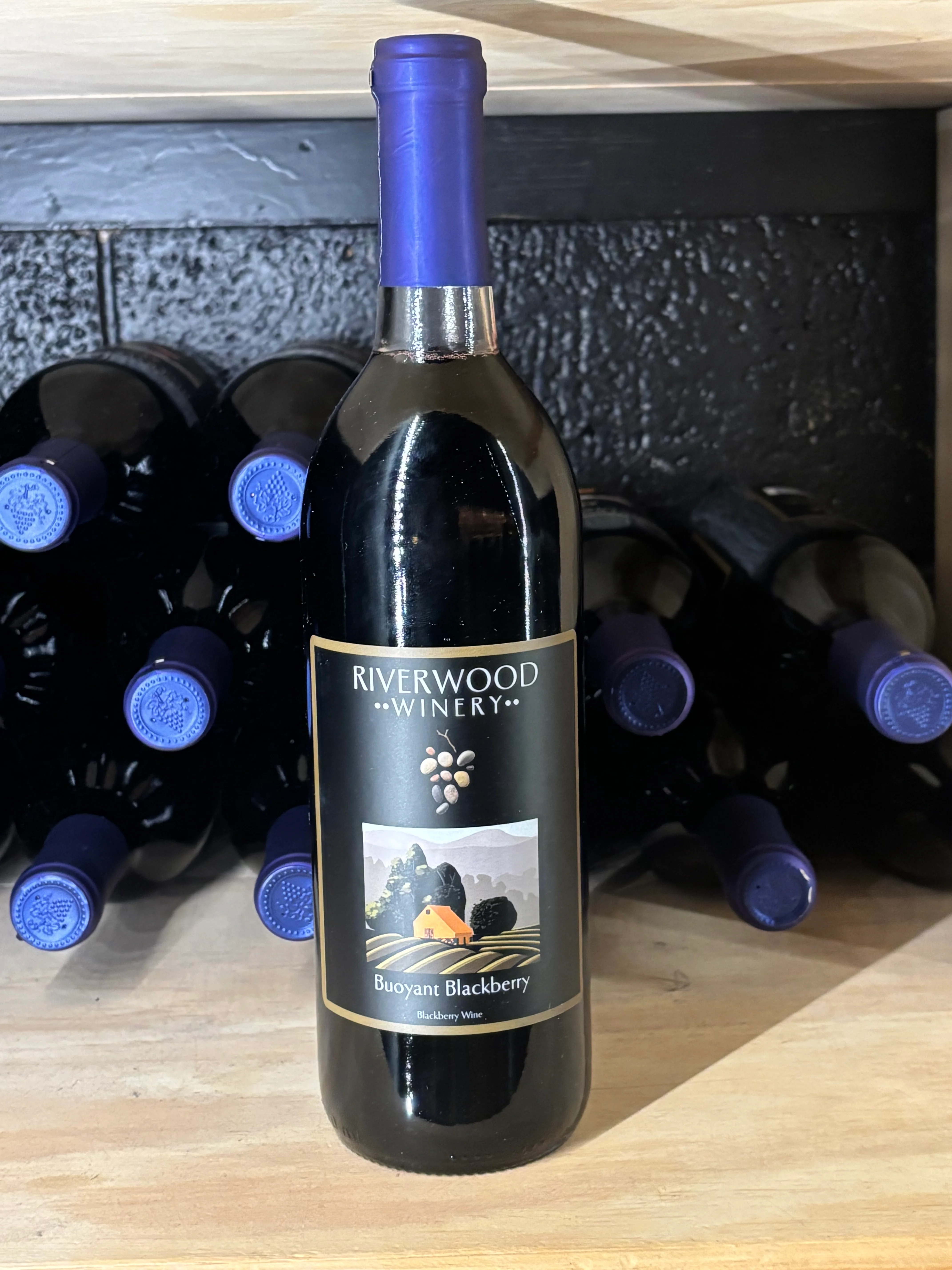 Bottle of Riverwood Winery Buoyant Blackberry wine