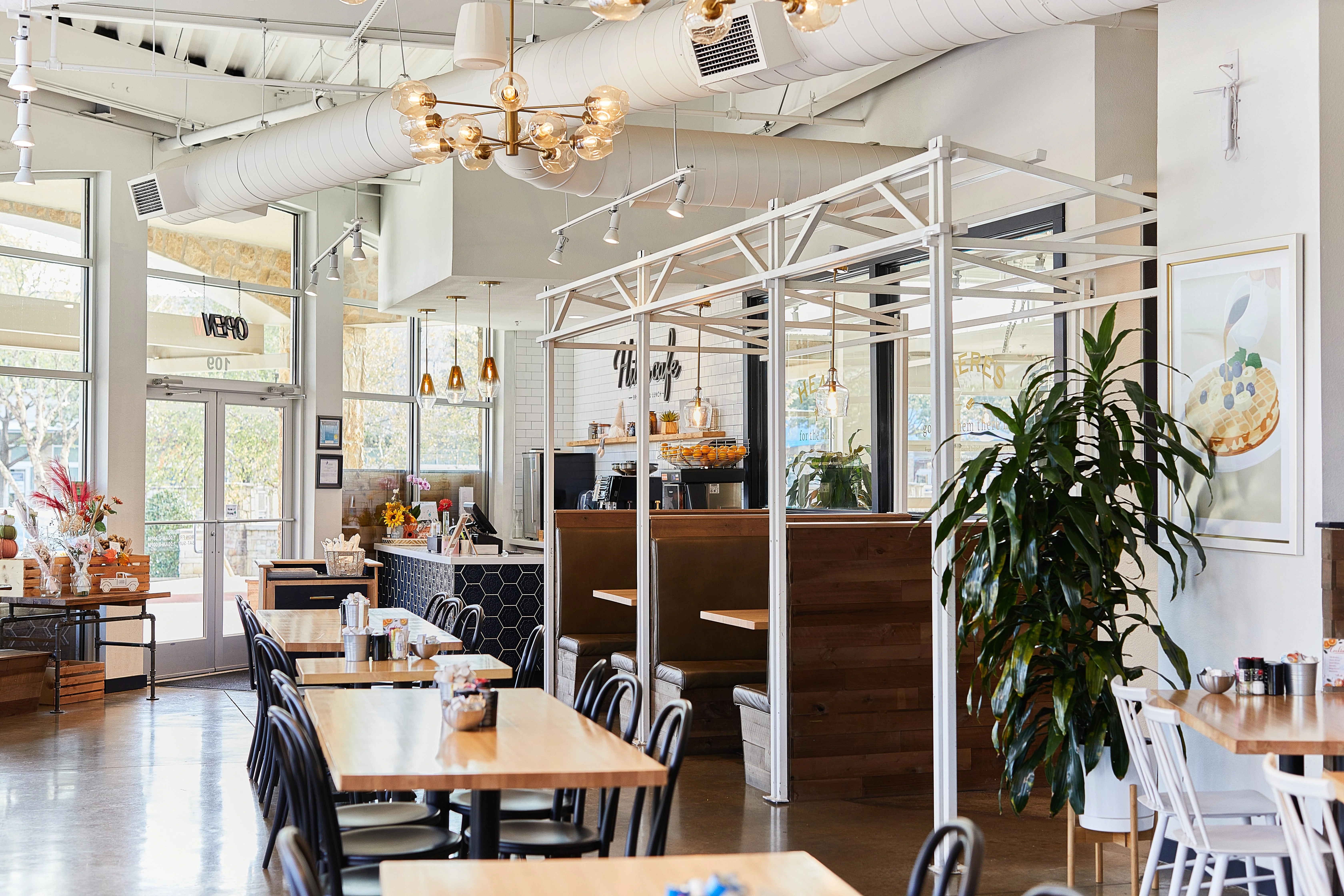 Modern restaurant interior with stylish decor and natural lighting