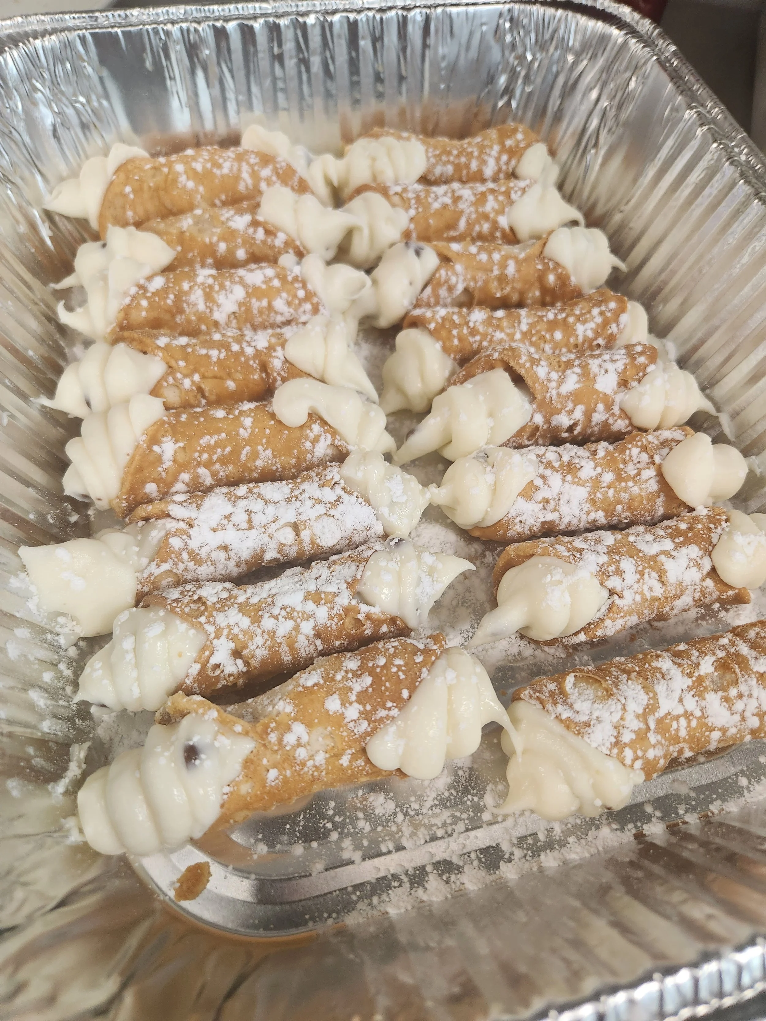 Italian cannoli filled with sweet ricotta cream