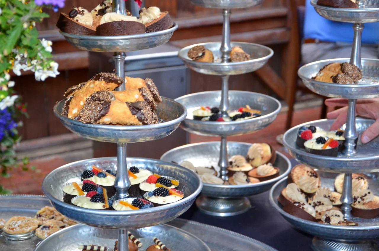 An assortment of delicious desserts including cakes and pastries.