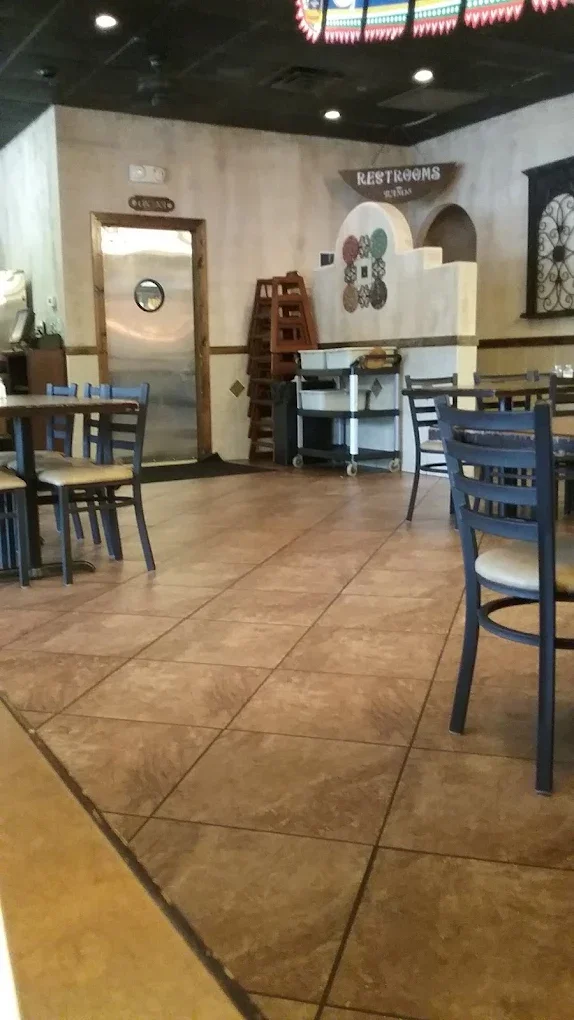 Cozy restaurant interior with wooden accents and seating