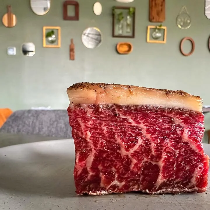 A beautifully marbled slice of Wagyu beef steak