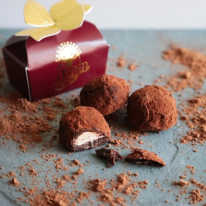 Decadent chocolate truffles dusted with cocoa powder