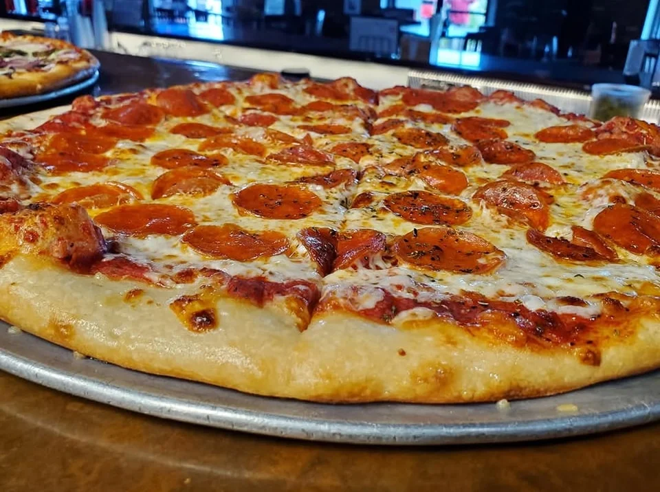 Pepperoni pizza with a golden crust and melted cheese