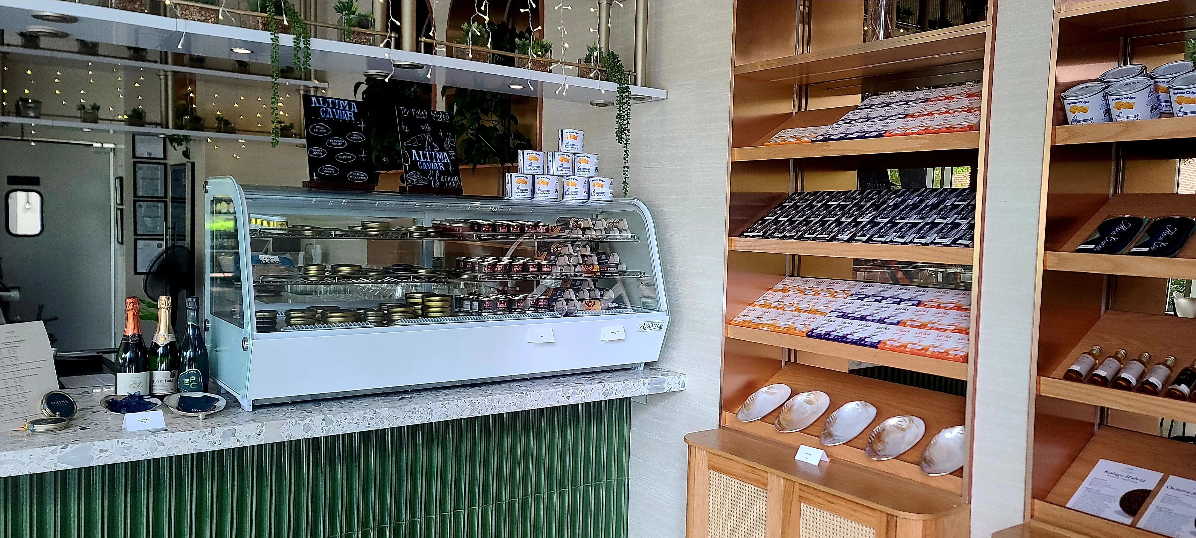 Elegant display of gourmet caviar and fine wines in a chic restaurant