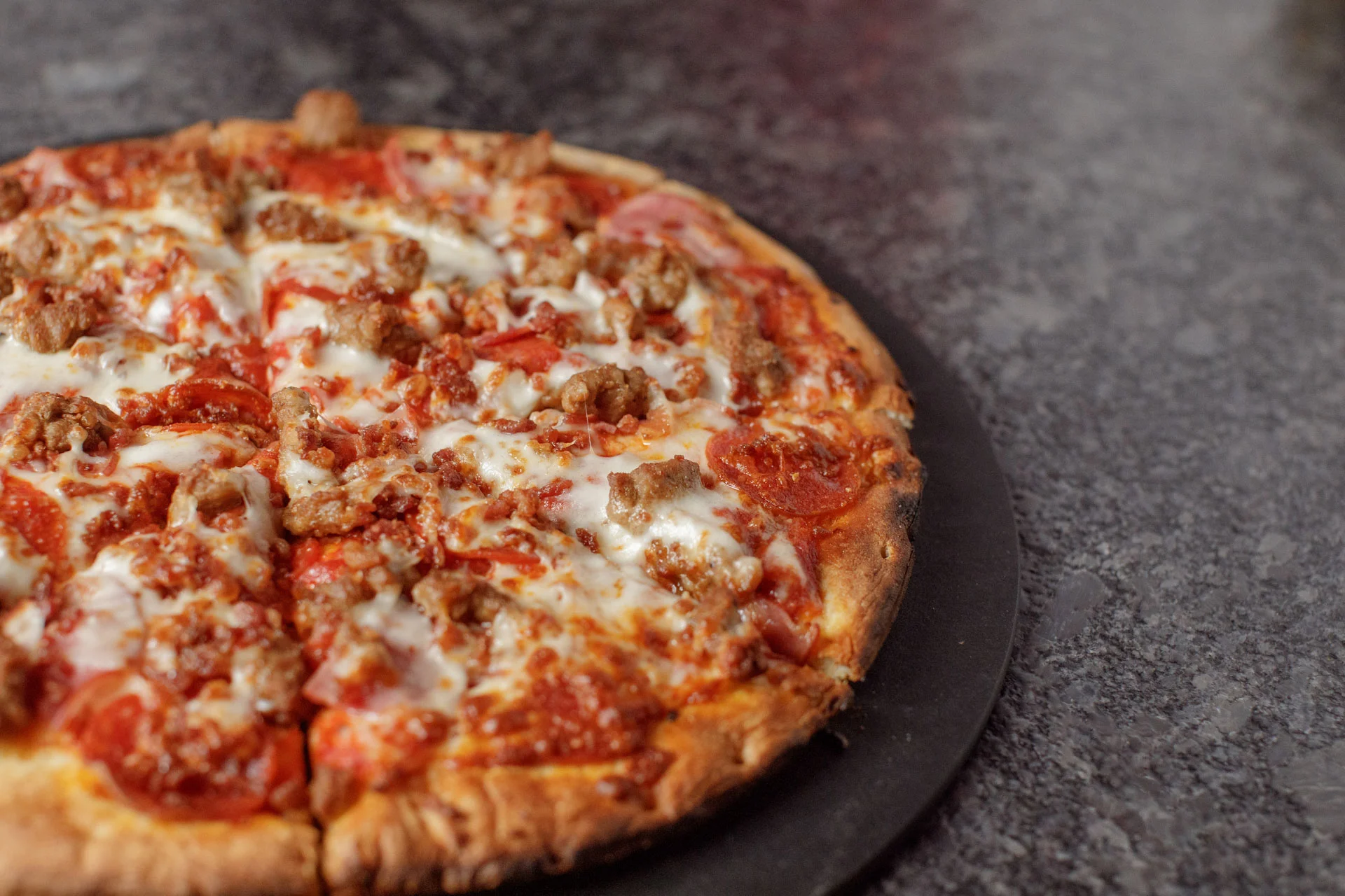 Savory pepperoni pizza with sausage topping