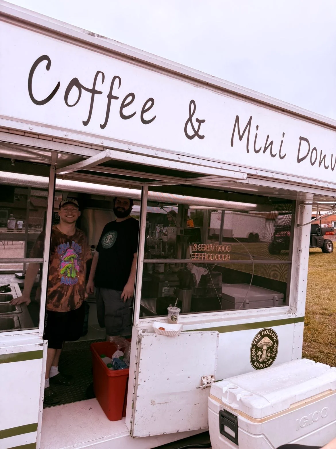 Coffee and mini donuts food truck serving customers