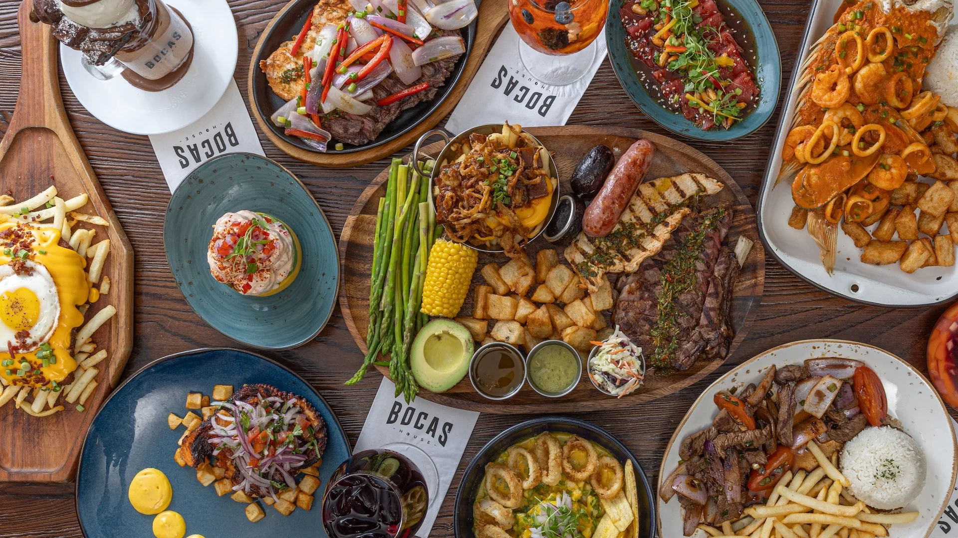 Assorted Latin American dishes on a wooden table