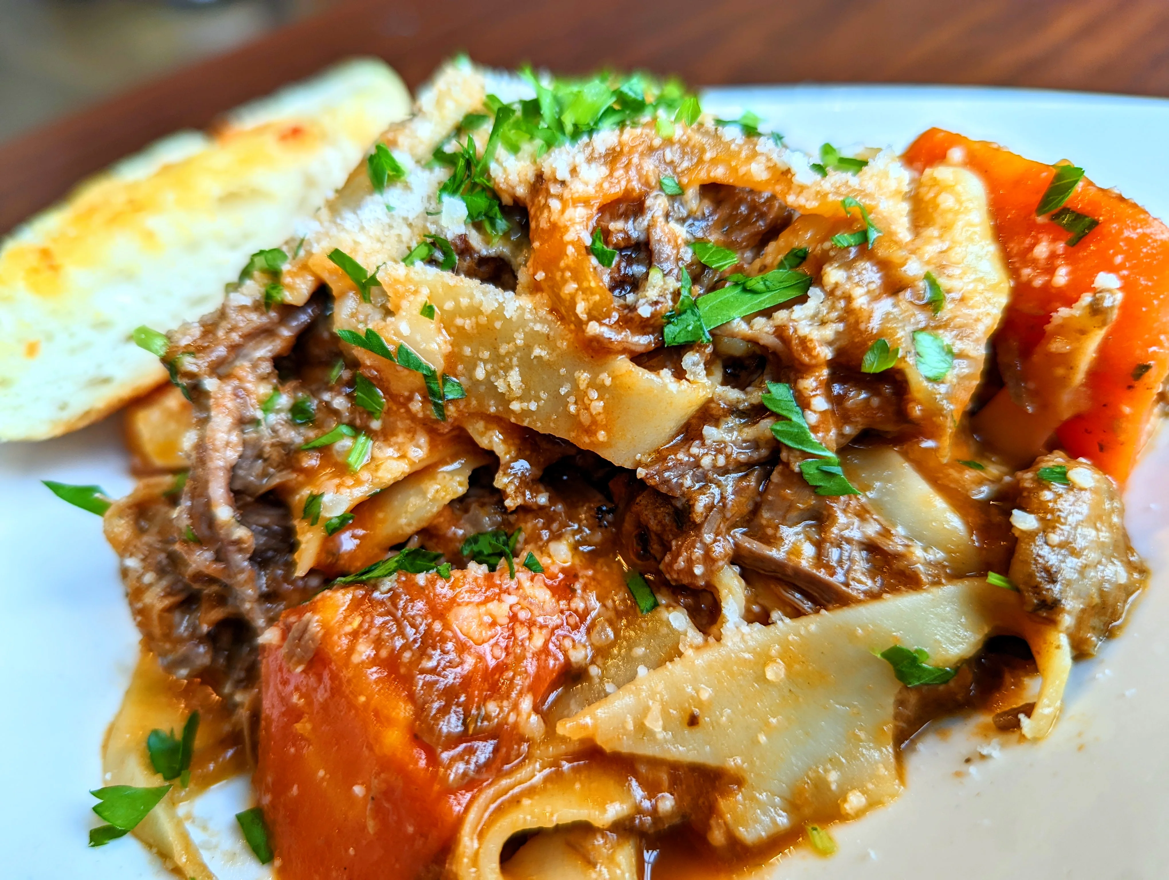 braised short rib ragu over pappardelle pasta