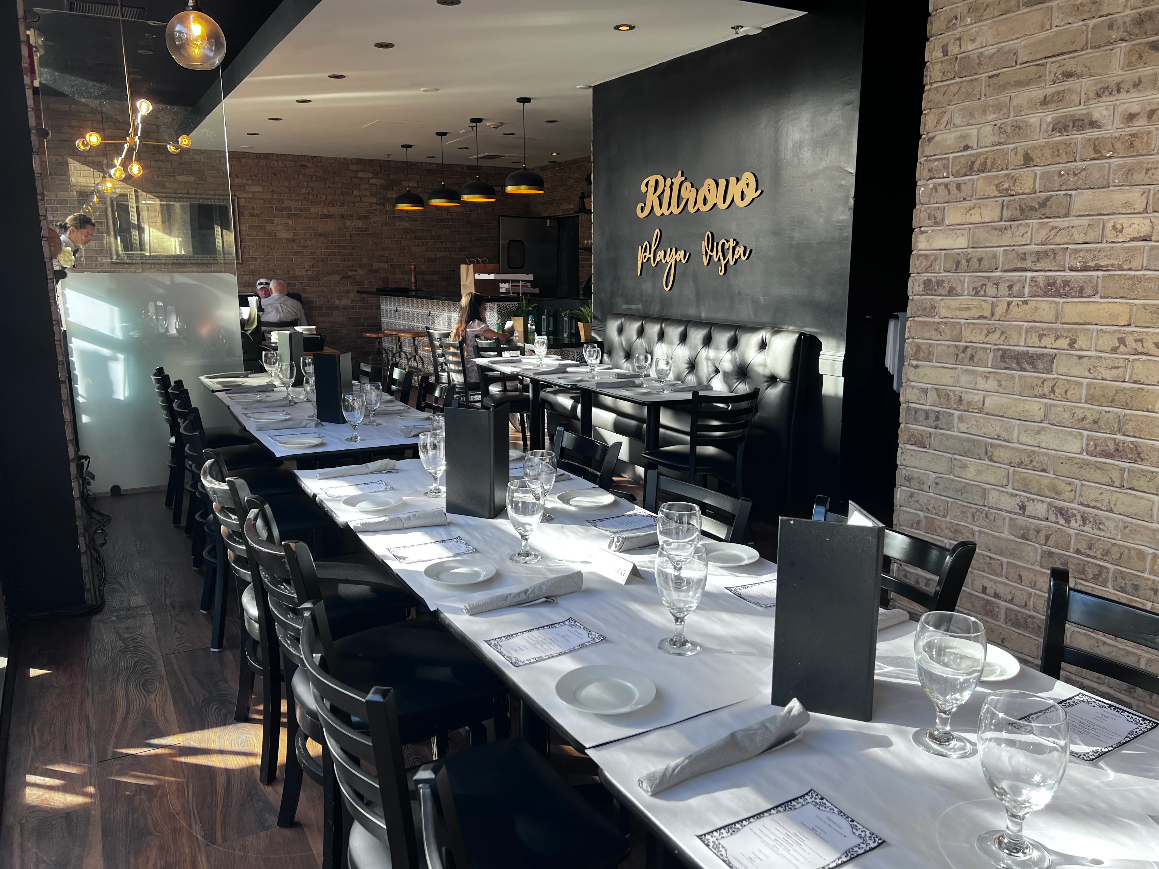Cozy restaurant interior with elegant seating and warm lighting