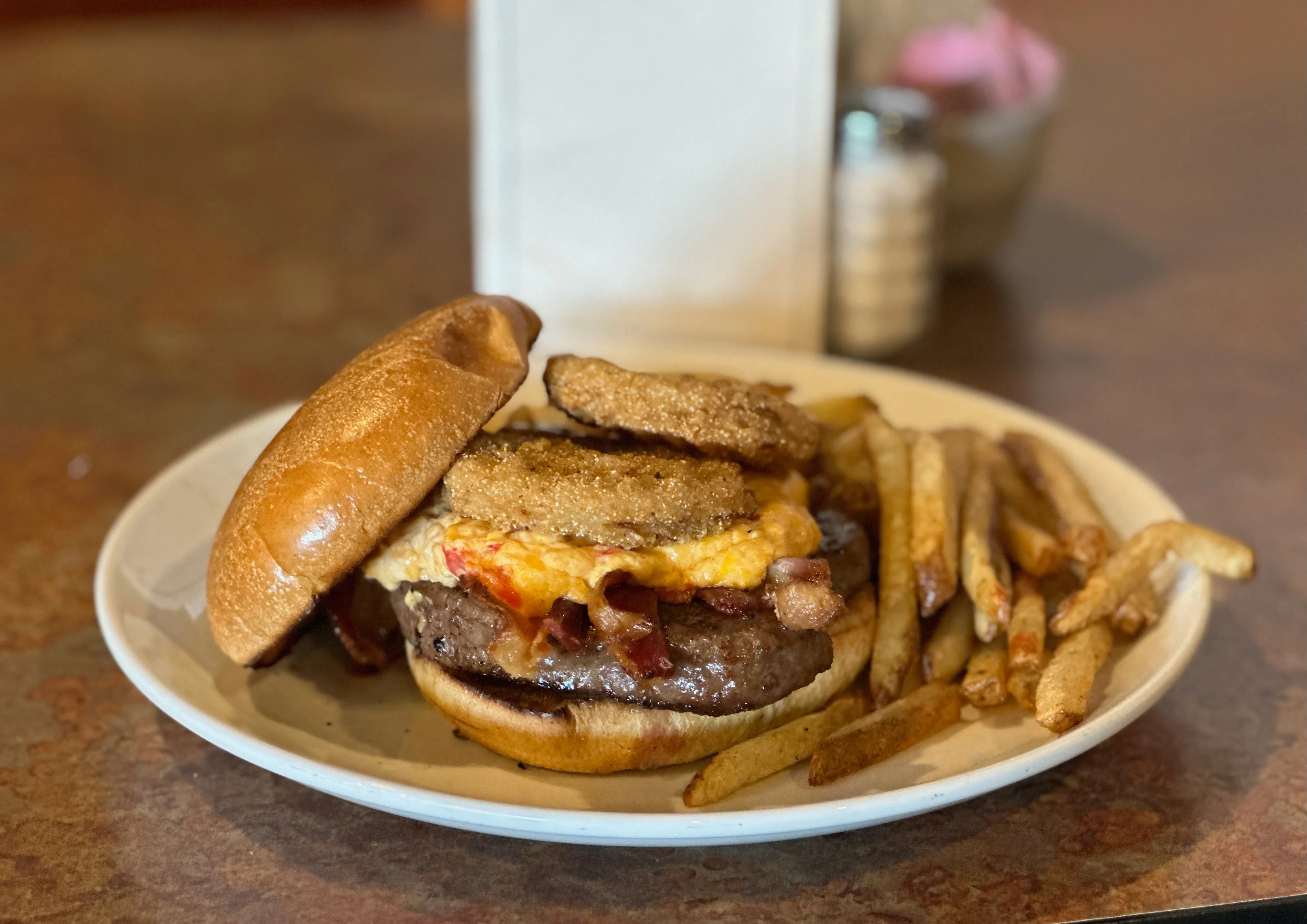 Hearty Southern-style burger with fried toppings