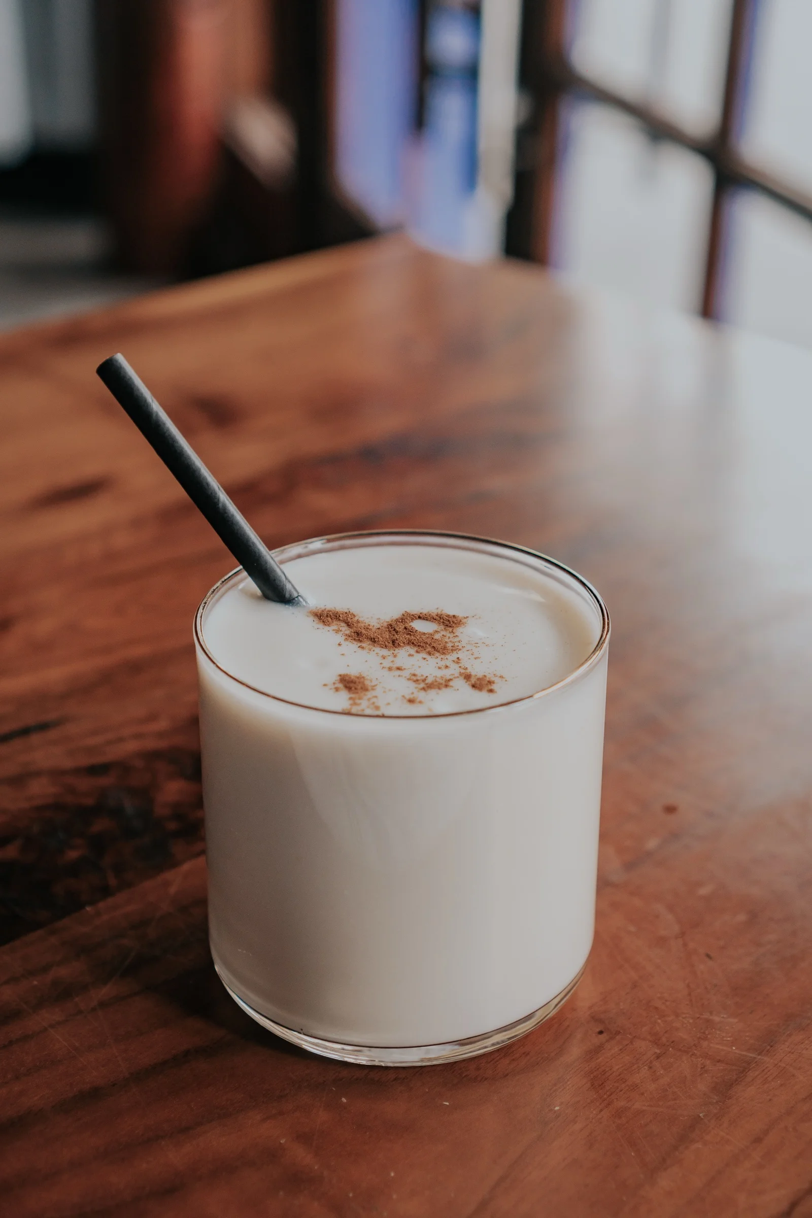 Creamy drink with a dusted topping served at Castro Indian Restaurant