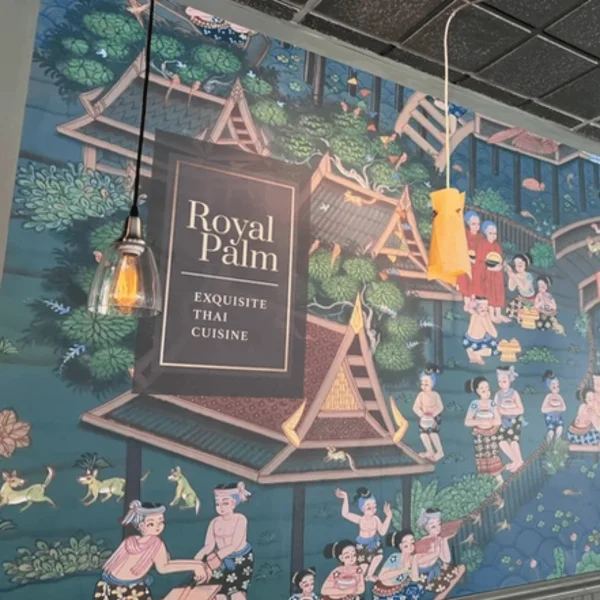 Interior mural of Royal Palm Thai restaurant with vibrant artwork