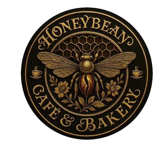 Elegant logo of Honeybeany Cafe & Bakery featuring a bee and floral design