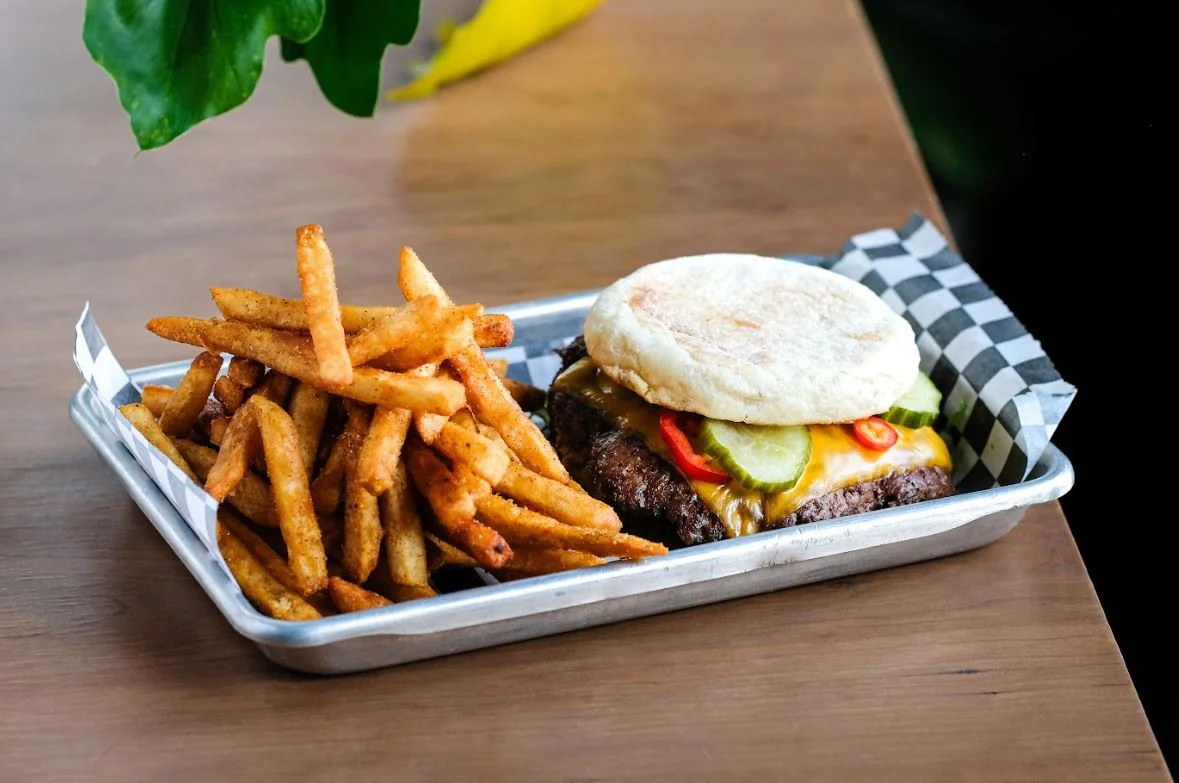 Classic American cheeseburger with fries