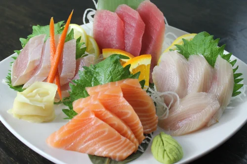 Japanese sashimi platter with assorted fresh fish and garnishes